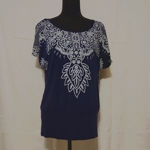 B.L.E.U Blouse Sz. S blue with lace pattern design 95%Rayon and 5% Spandex